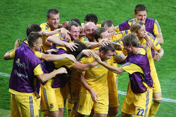 Andriy+Shevchenko+celebrates+his+brace+with+team+mates