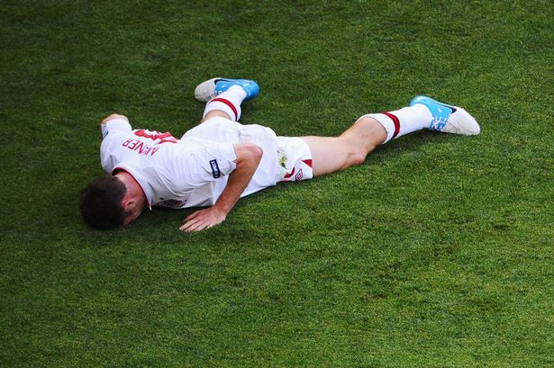 James+Milner+goes+down+injured