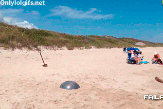 gif-flip-head-sand.gif