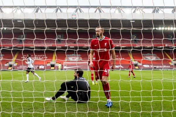 LIVERPOOL, ENGLAND - Sunday, March 7, 2021: Liverpool's goalkeeper Alisson Becker (L) and Nathaniel Phillips look dejected as Fulham score the opening goal during the FA Premier League match between Liverpool FC and Fulham FC at Anfield. (Pic by David Rawcliffe/Propaganda)