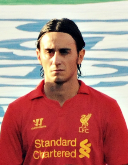 Sterling%2C_Spearing%2C_Eccleston%2C_Aquilani%2C_Enrique%2C_Shelvey_%28cropped%29.jpg